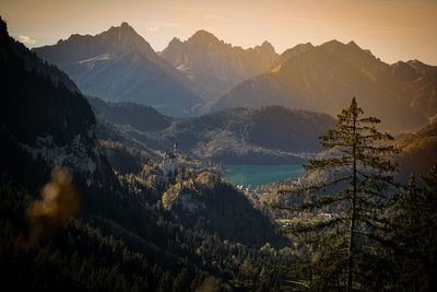 Castle neuschwanstein in front of lake alp in bavaria