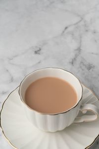 Close-up of tea cup on table