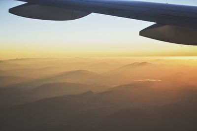 Aerial view of landscape with mountains in background