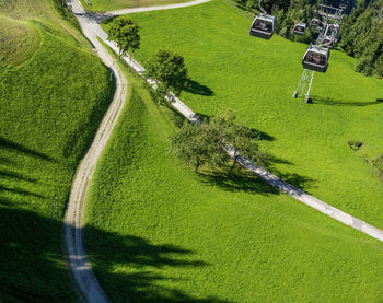 High angle view of cable car over golf course

