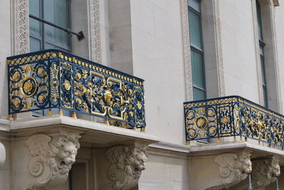 Low angle view of sculptures on wall of building