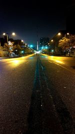 Illuminated street lights at night