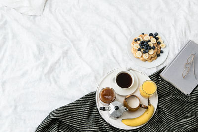 High angle view of breakfast served on table