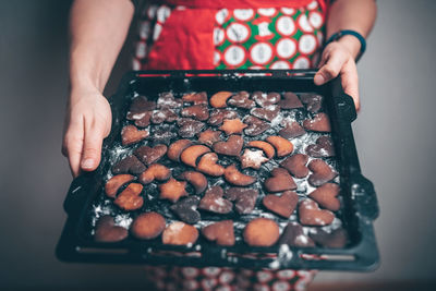 Midsection of person preparing food