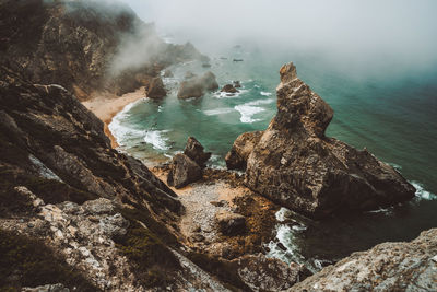 High angle view of rocks at beach