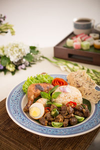 Close-up of salad in plate on table