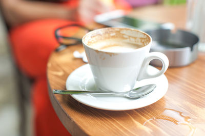 Close-up of cappuccino on table