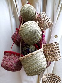 Close-up of clothes hanging in basket