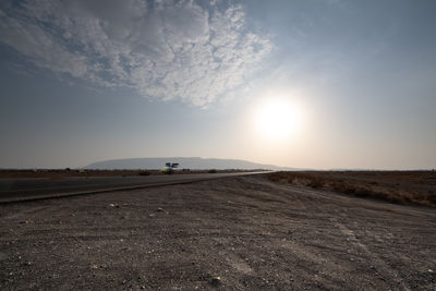 Scenic view of beach against sky during sunset