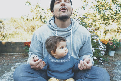 Cute baby girl with father