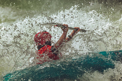 Close-up of man kayaking 