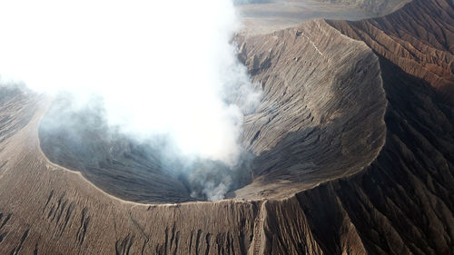 Smoke emitting from volcanic mountain