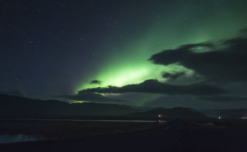 Scenic view of sea against sky at night