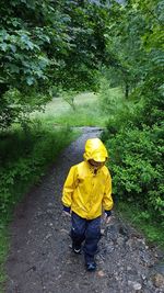 Man with yellow umbrella