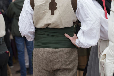 Rear view of couple standing outdoors