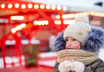 Close-up of girl blowing bubbles