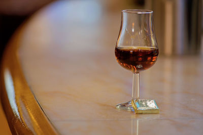 Close-up of rum drink on table