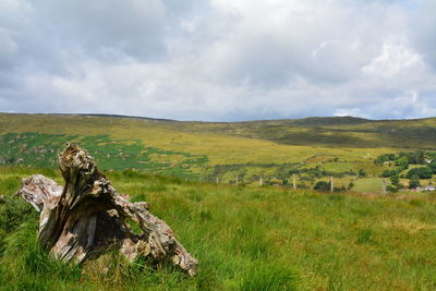 Scenic view of land against sky