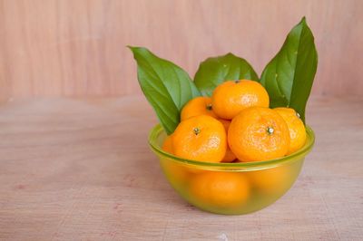 Close-up of orange fruit on table
