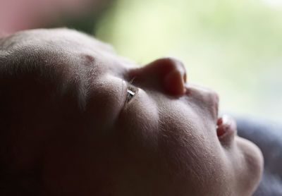 Close-up of boy looking away