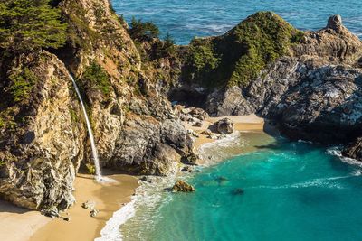 High angle view of cliffs by sea at julia pfeiffer burns state park