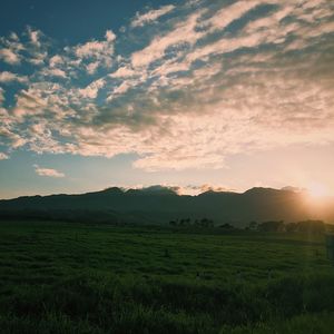 Scenic view of landscape against sky during sunset