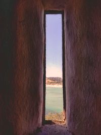 Scenic view of sea seen through window