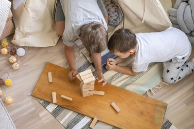 High angle view of mother and daughter at home