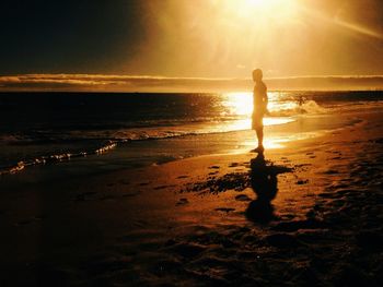 Scenic view of sea at sunset