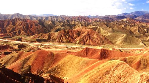 Panoramic view of landscape with mountain range in background