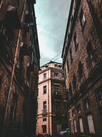 Low angle view of buildings against sky