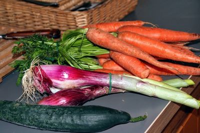 High angle view of vegetables in basket on table