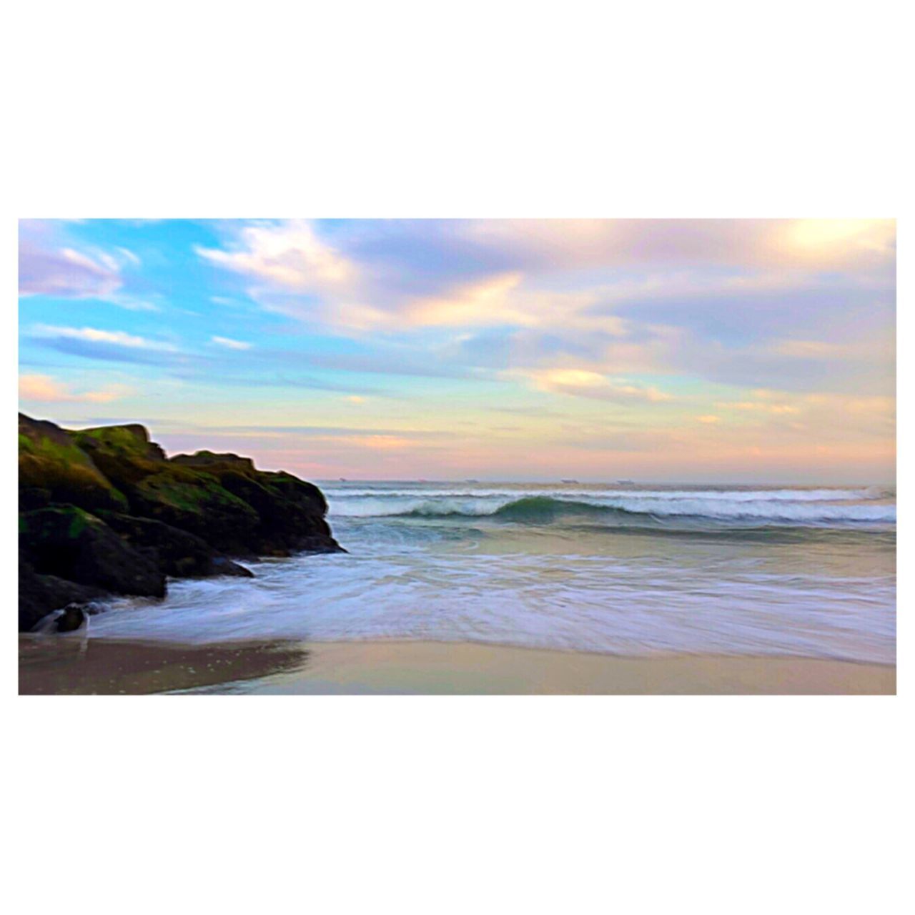 sea, horizon over water, water, scenics, beach, tranquil scene, beauty in nature, transfer print, tranquility, shore, sky, sunset, auto post production filter, nature, idyllic, rock - object, wave, coastline, rock formation, seascape