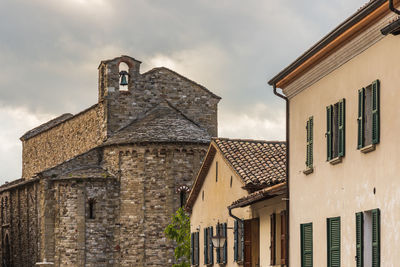 Low angle view of old building against sky