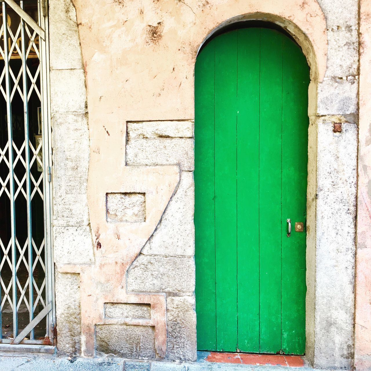 architecture, built structure, building exterior, door, entrance, closed, security, protection, safety, day, window, building, green color, no people, house, wall - building feature, wood - material, outdoors, residential district, arch, turquoise colored