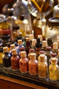 Close-up of bottles on display at store