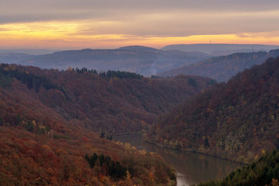 Scenic view of mountains against sky during sunset