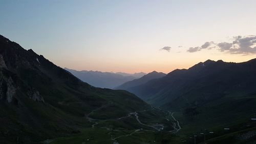 Scenic view of mountains against sky during sunset