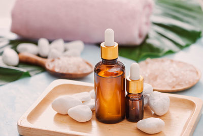 Close-up of essential oils on table