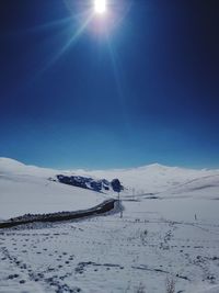 Scenic view of snow covered mountain against sky