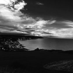 Scenic view of sea against cloudy sky