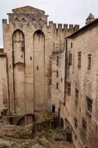 Low angle view of old building against sky