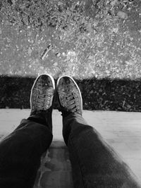 Low section of man standing outdoors