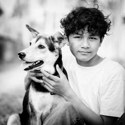 Portrait of boy with dog
