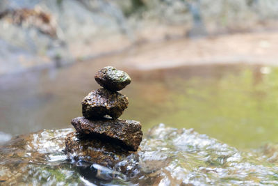 Close-up of stone stack on rock