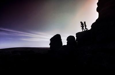 Scenic view of silhouette landscape against sky