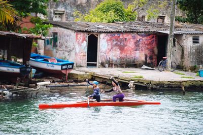 Man on boat against trees