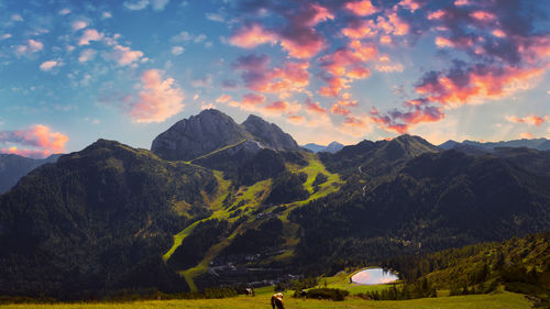 Scenic view of mountains against sky during sunset