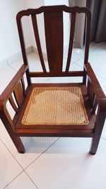 High angle view of empty chairs at table