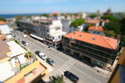 High angle view of street amidst buildings in town